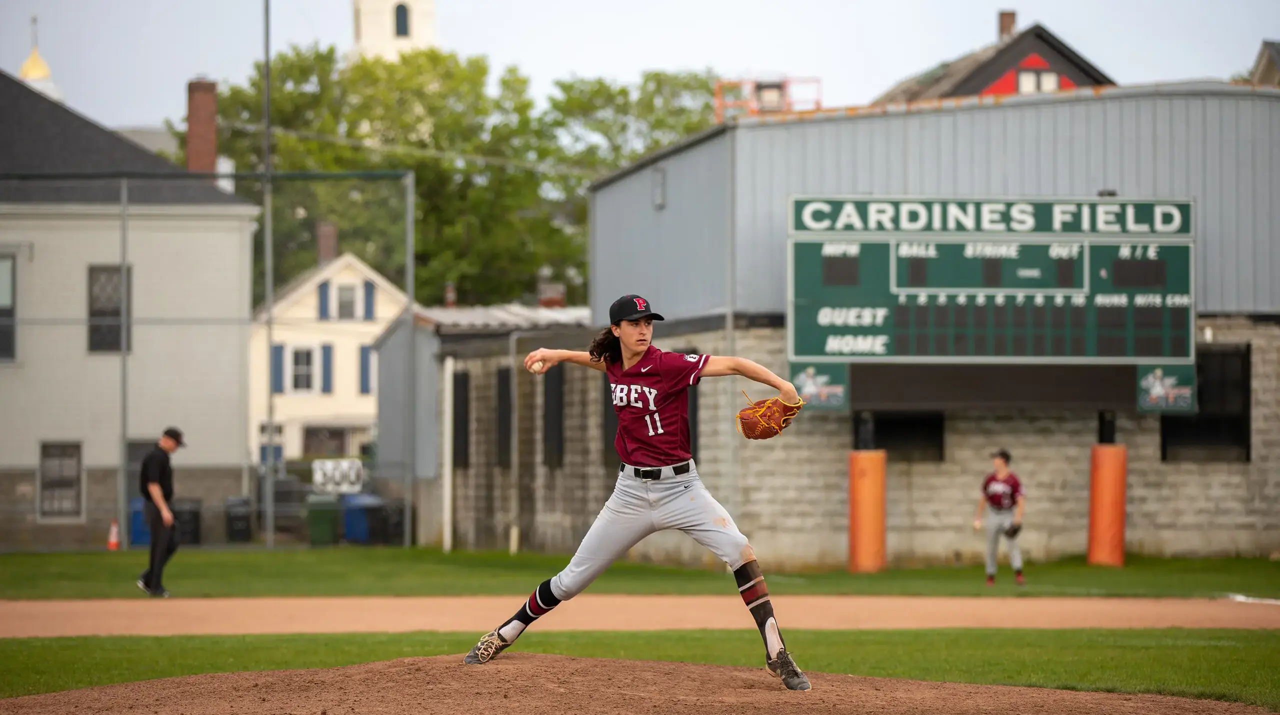 Student pitching at famous Cardines Field in Newport.